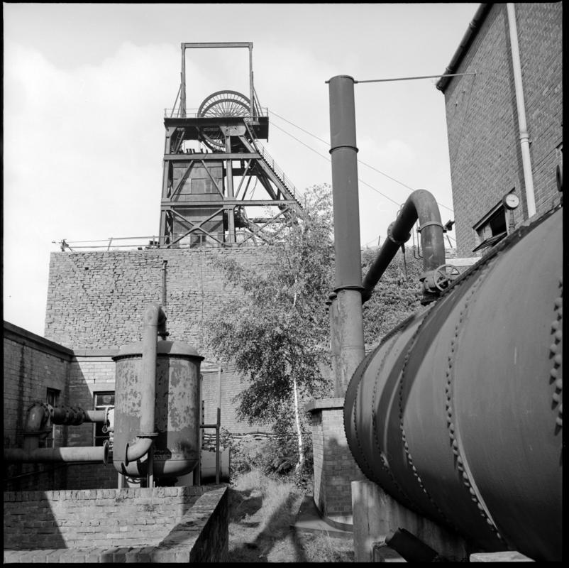 Black and white film negative showing the upcast headgear, Celynen North Colliery, 11 October 1975.  'Celynen North 11 Oct 1975' is transcribed from original negative bag.