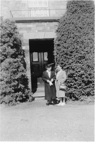 Dinorwig Quarry Hospital. Clemontine de Wulf (Vivian Hughes' grandmother) and Mariette (Vivian Hughes' cousin) outside the main entrance porch (with balcony above) to DQH. Note that the porch and balcony no longer exists.