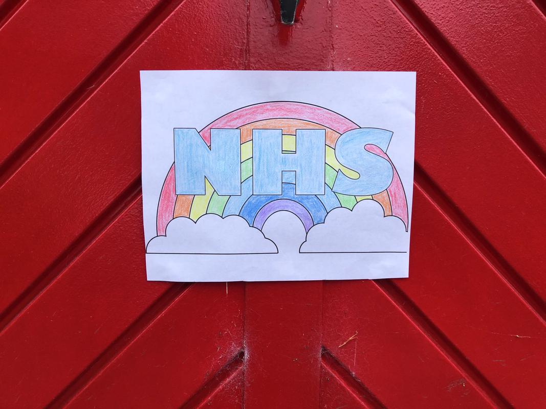 NHS' drawing on the door of a house in Caerwent