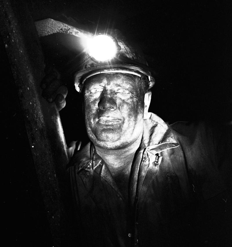 Black and white film negative showing a miner, Oakdale Colliery, May 1980.  'Oakdale May 1980' is transcribed from original negative bag.