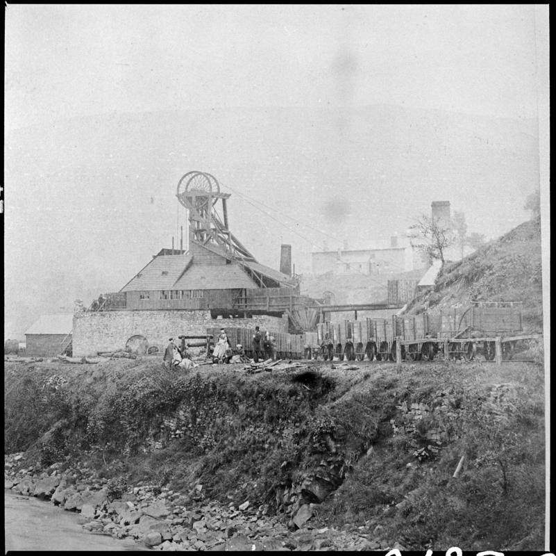 Black and white film negative of a photograph showing a general surface view of Cymmer Colliery, 1860.   'Cymmer' is transcribed from original negative bag.  Appears to be identical to 2009.3/1632.