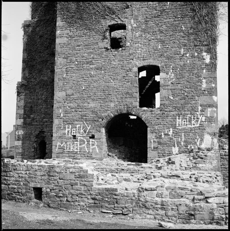 Black and white film negative showing the remains of the engine house with graffiti, Scott's Pit, Llansamlet. 'Scotts Pit' is transcribed from original negative bag.