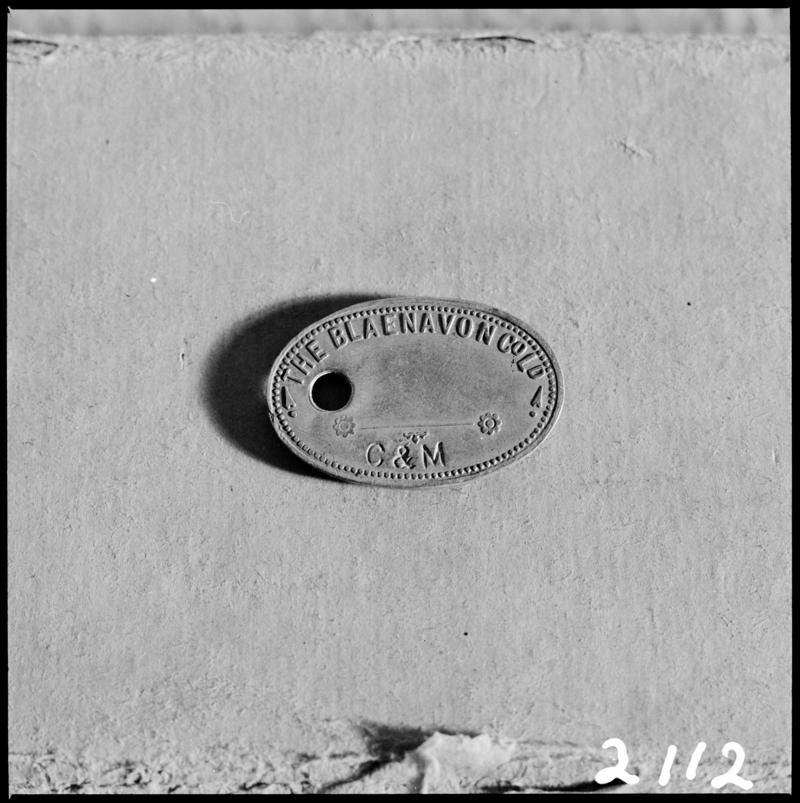 Black and white film negative showing a Blaenavon Co. Ltd. lamp check.  'Blaenavon check' is transcribed from original negative bag.