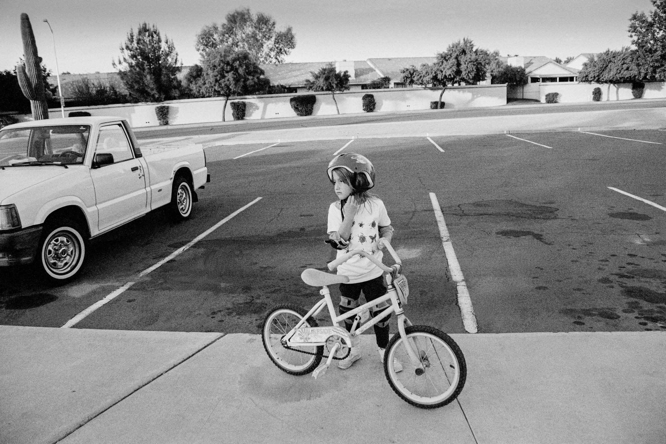 Mesa. Child with her bike. Phoenix, Arizona USA