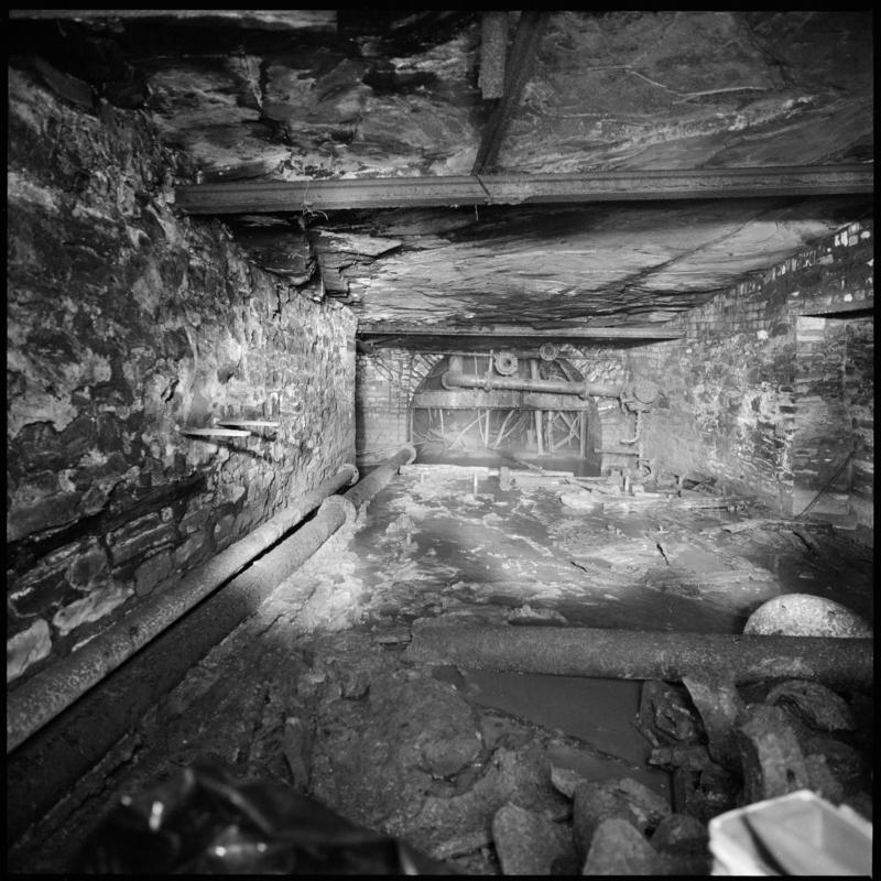Black and white film negative showing the no. 3 landing, hetty shaft, Tymawr Colliery March 1980.  'No 3 landing hetty shaft, march 1980' is transcribed from original negative bag.