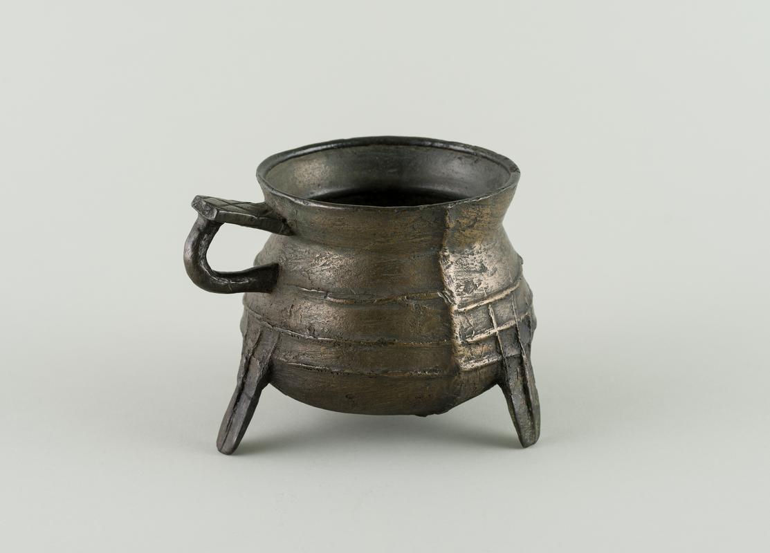 Post medieval copper alloy tripod pipkin