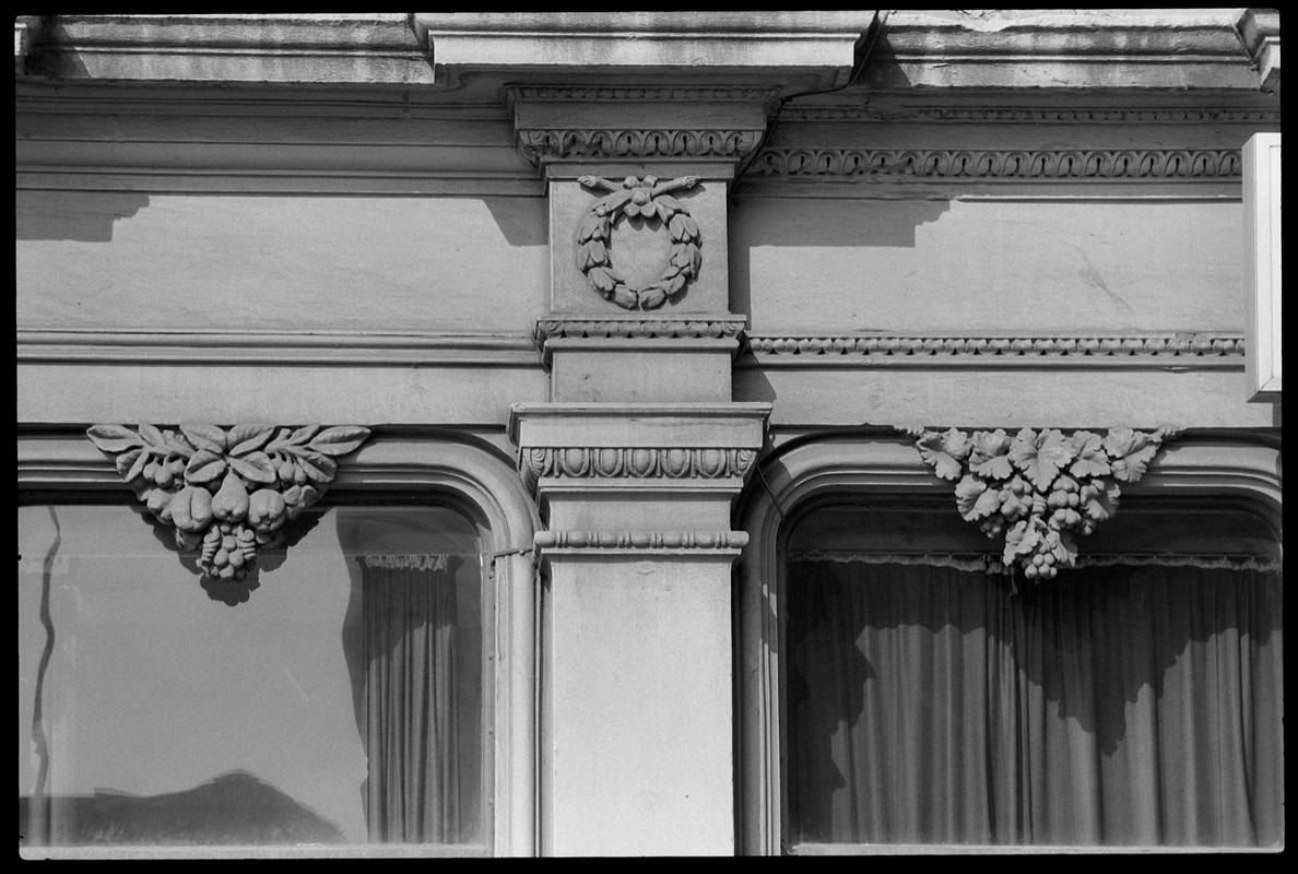 Decoration above windows of Docks Non-Political Club, Bute Street.