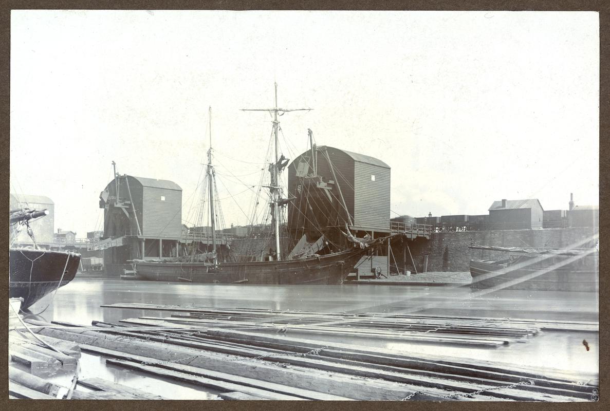 Brigantine loading at tips in Bute West Dock, Cardiff, 1888.