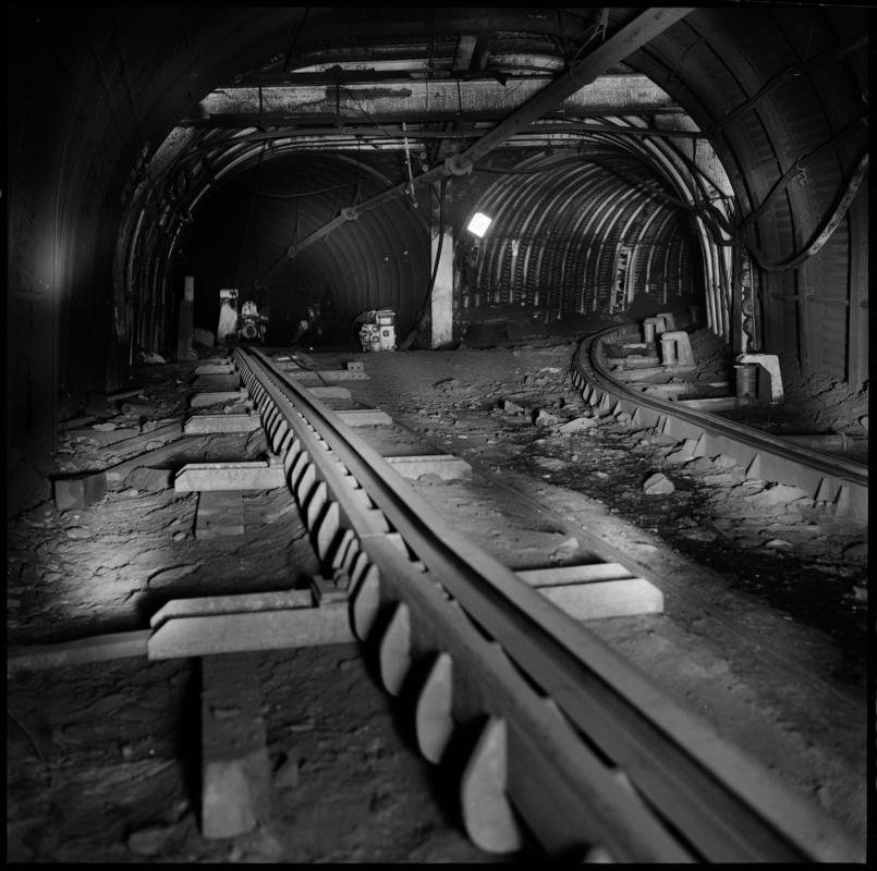 Black and white film negative showing an underground junction, Aberpergwm Colliery 1978.  'Aberpergwm 1978' is transcribed from original negative bag.