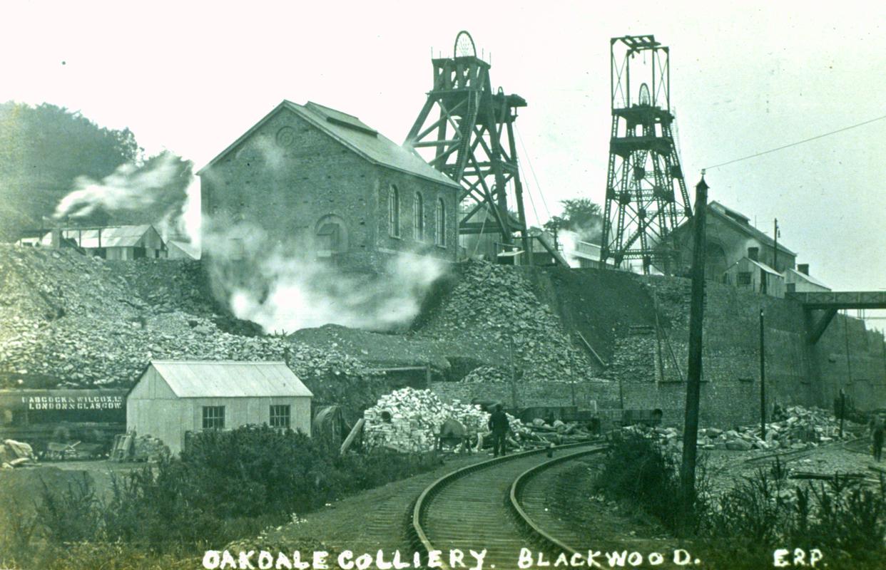 Black and white film slide of a photograph showing a general view of 'Oakdale Colliery, Blackwood'.
