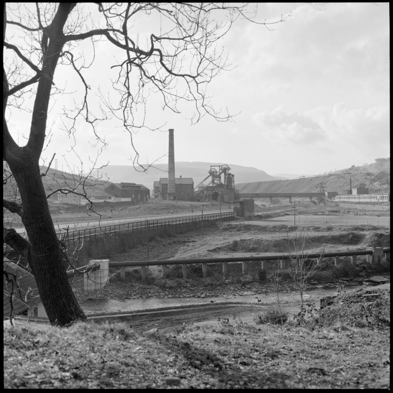 Black and white film negative showing a view towards Lewis Merthyr Colliery.  'Lewis Merthyr' is transcribed from original negative bag.