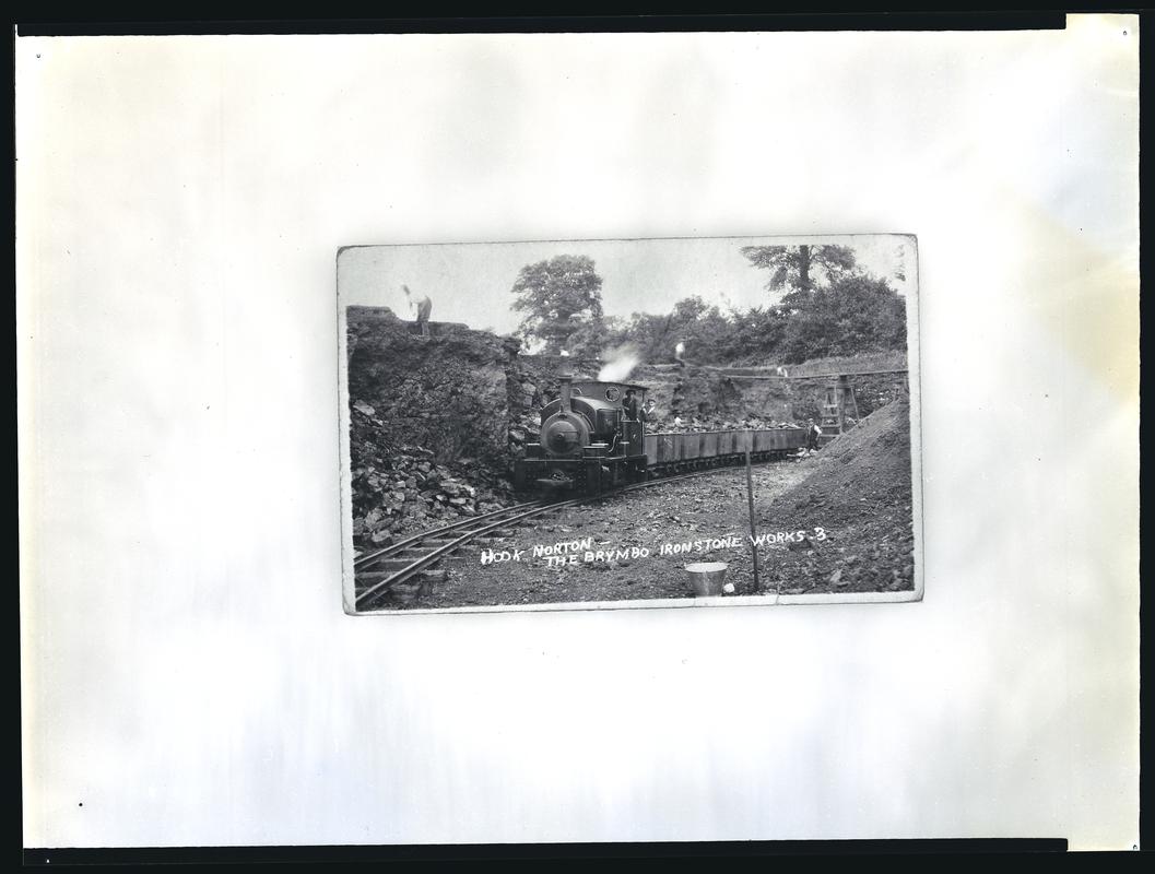 View showing steam locomotive pulling wagons of iron ore. "Hook Norton - The Brymbo Ironstone Works - 3".