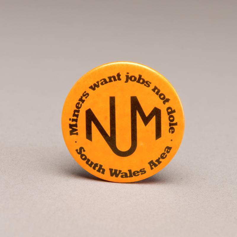 Badge: Miners Want Jobs Not Dole