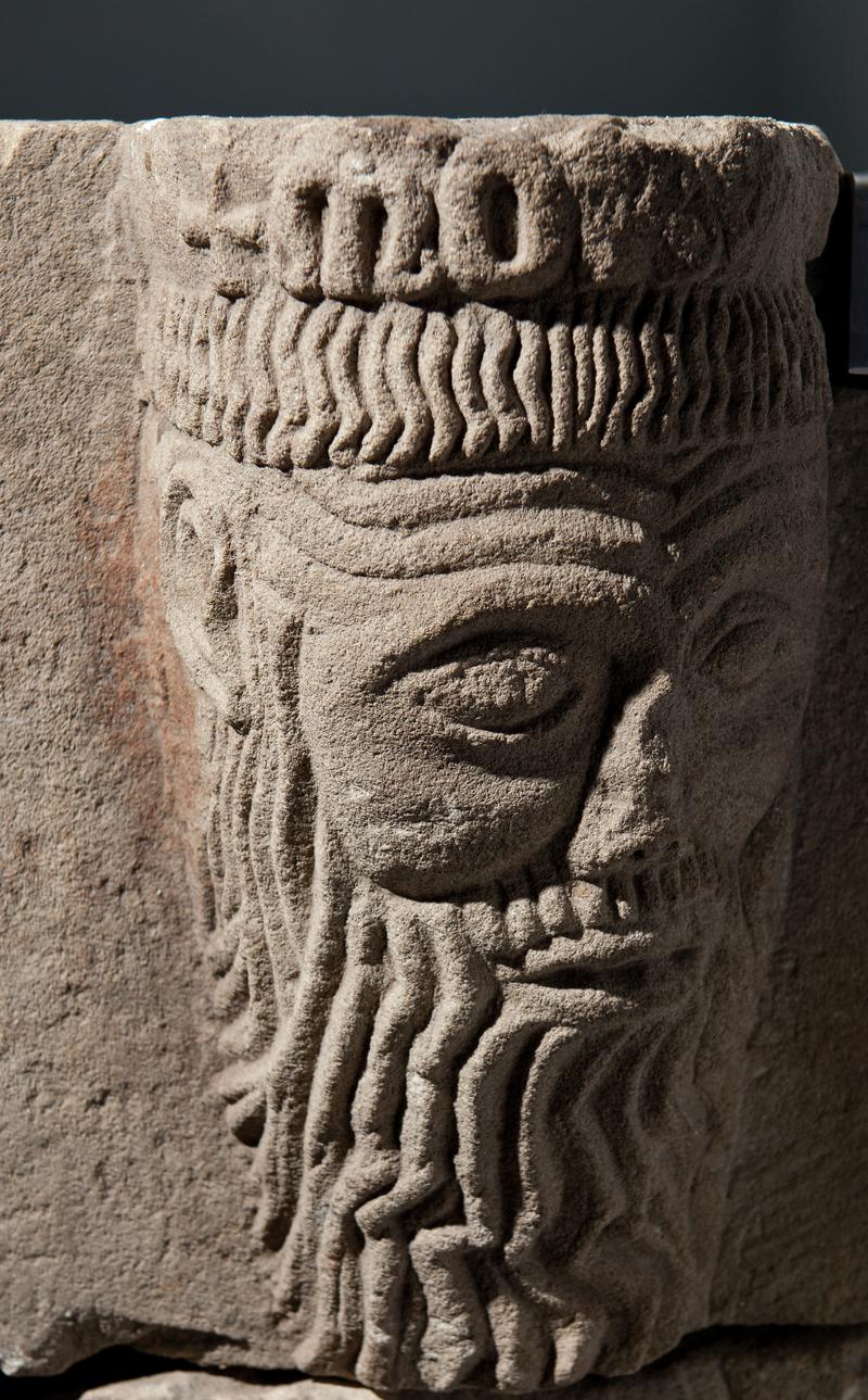 Medieval stone carved head