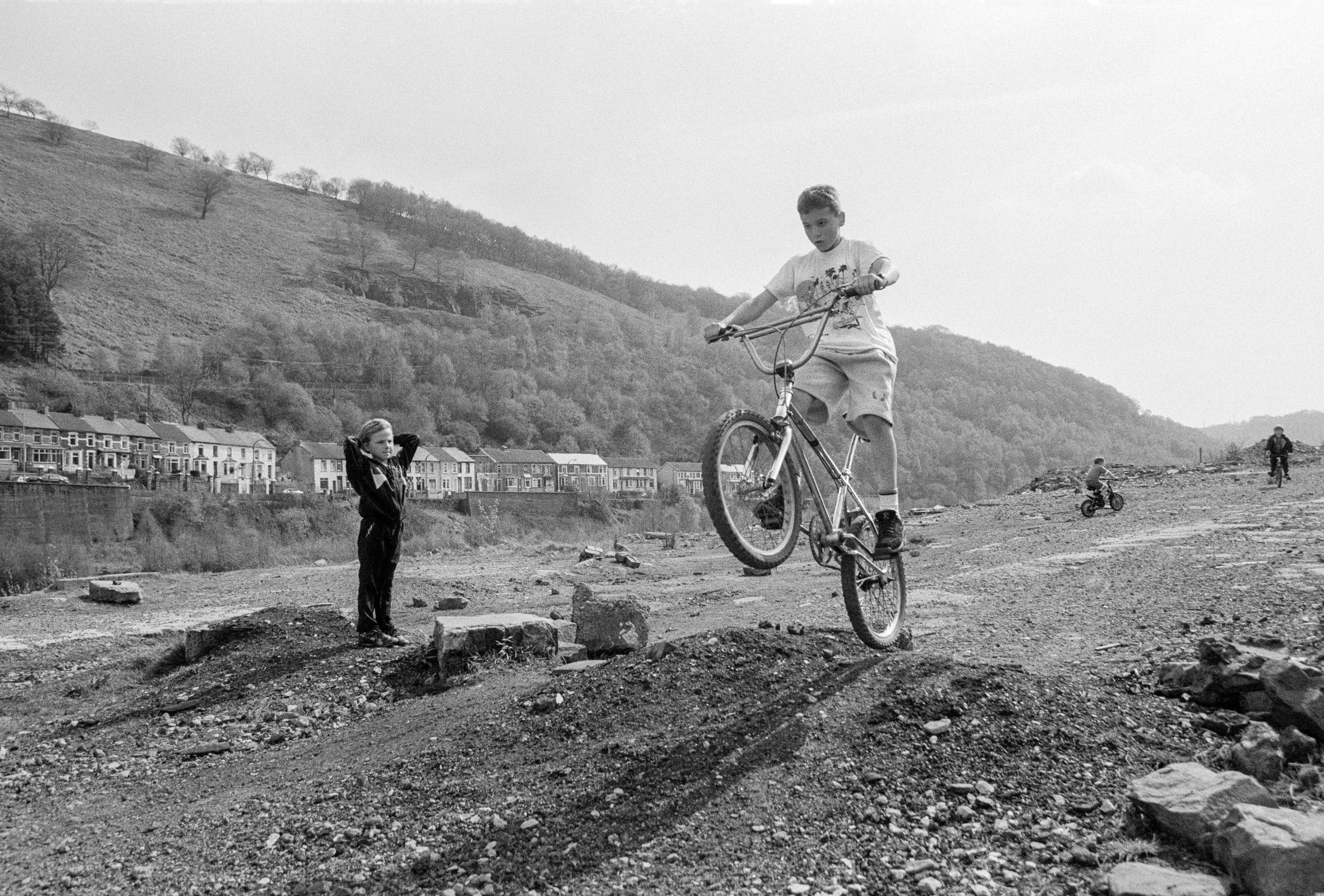 Children's fun on site of old Colliery. Six Bells, Wales
