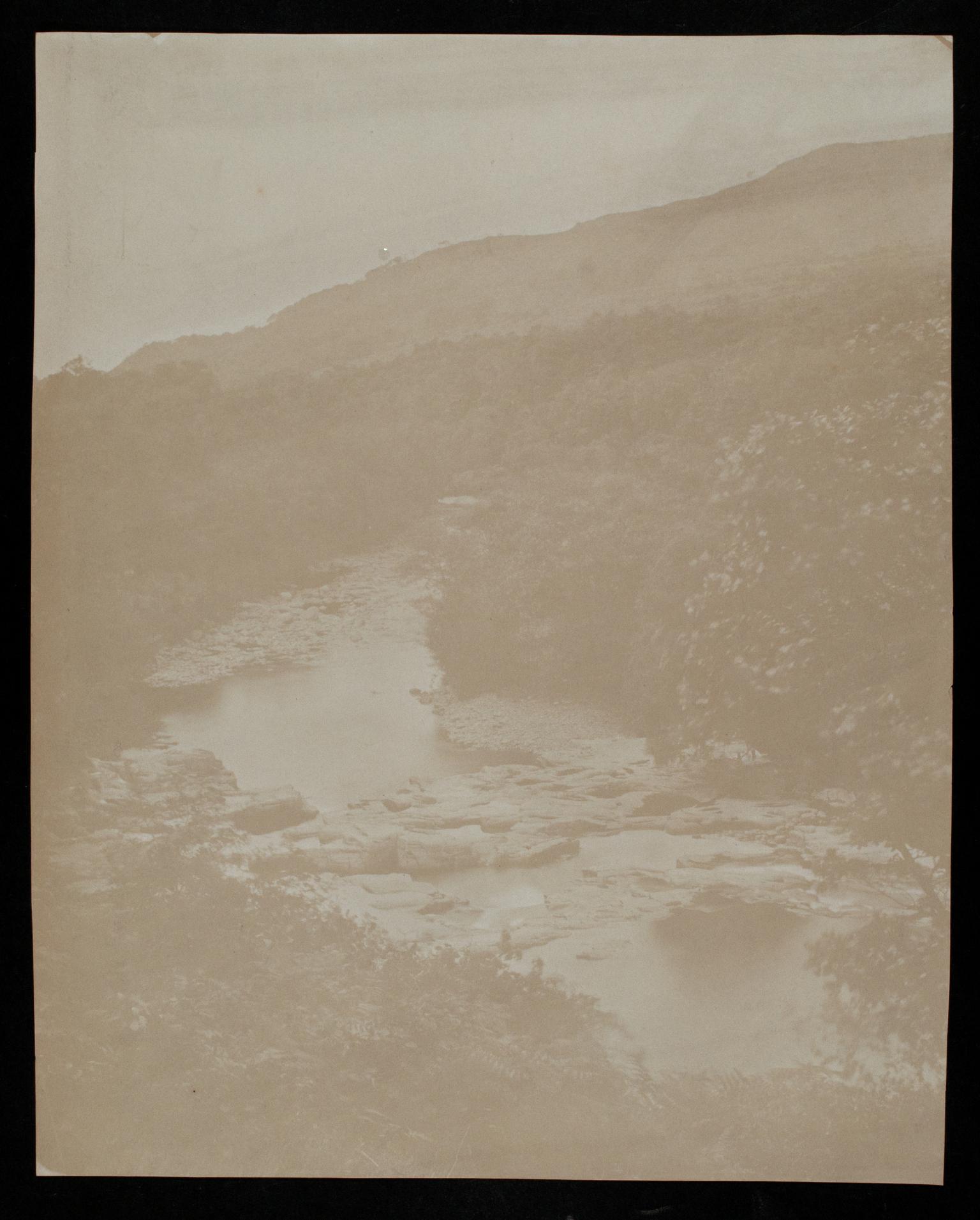 Rock strewn river, photograph