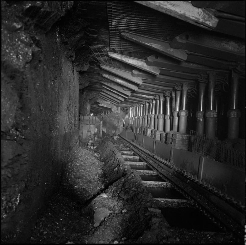 Black and white film negative showing powered supports and shearer on V44s face in the Gellideg seam, Deep Duffryn Colliery 1978.  'Deep Duffryn 1978' is transcribed from original negative bag.