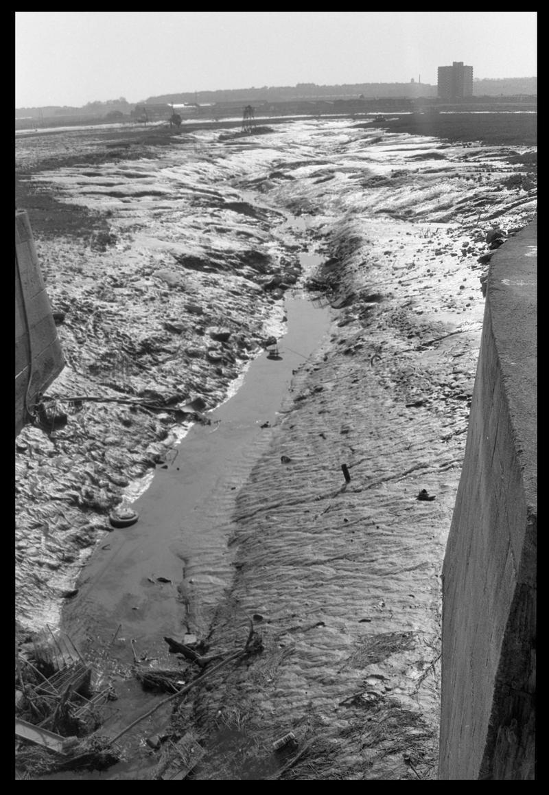 Remains of old canal where it enters the sea, at end of Stuart Street, Butetown.