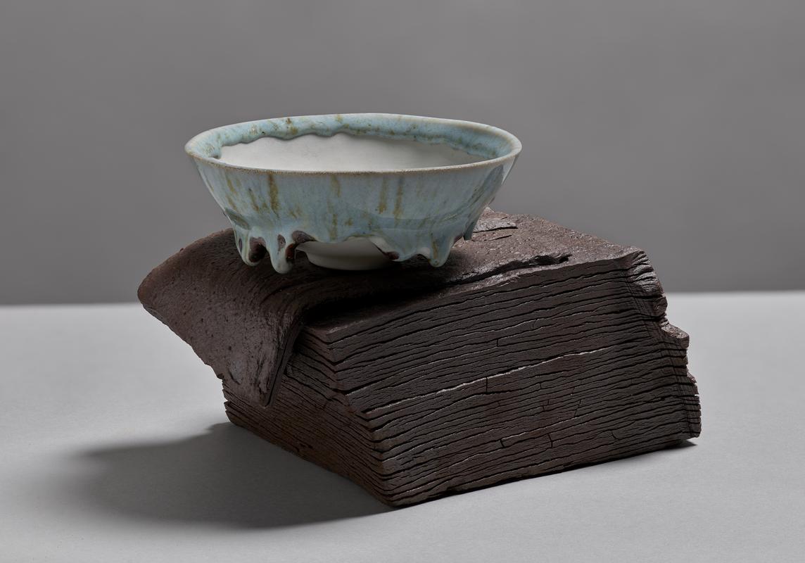 Y Nefoedd yn Toddi i’r Tir