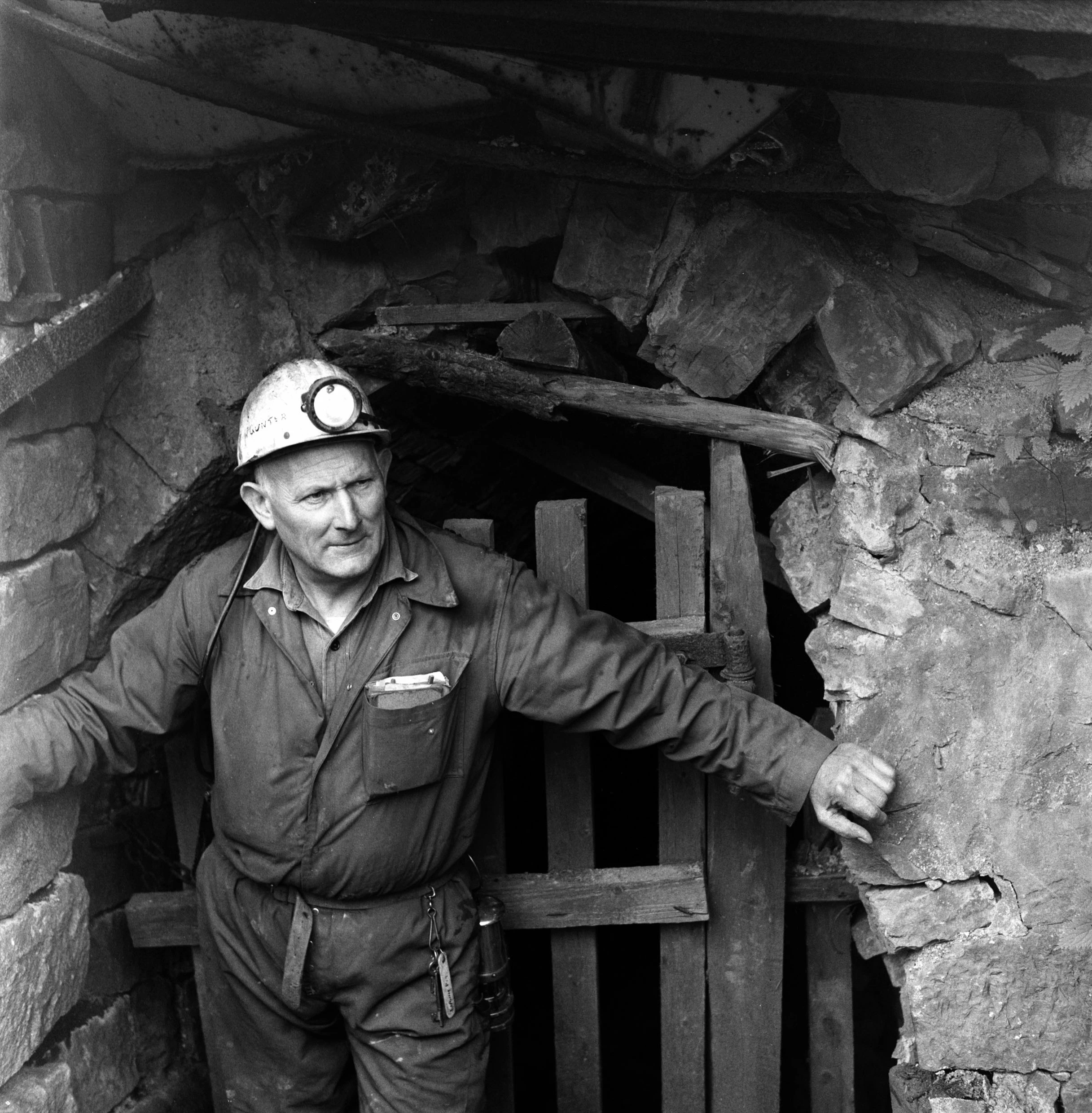 Bill Gunter standing at the archway to Dick Kear's Slope, driven around 1820. Big Pit.