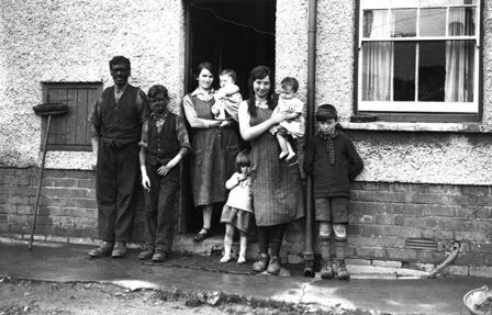 A Miner and his Family (b/w photo)