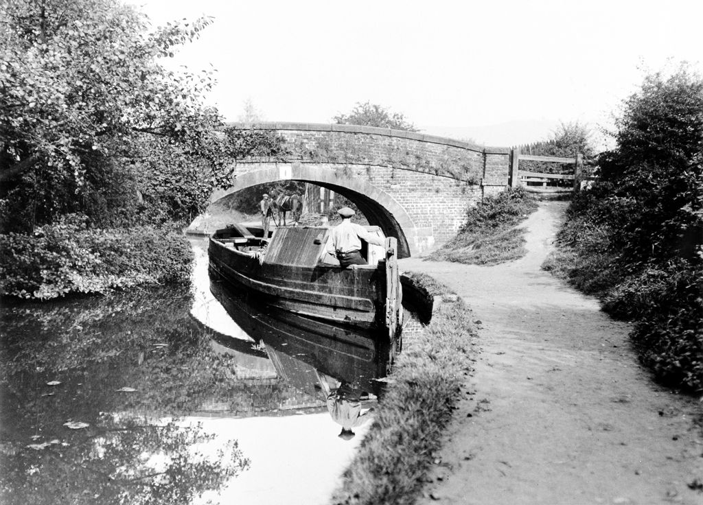 Barge at Crinday, Monmouth & Brecon canal bridge No.1 (b/w photo)