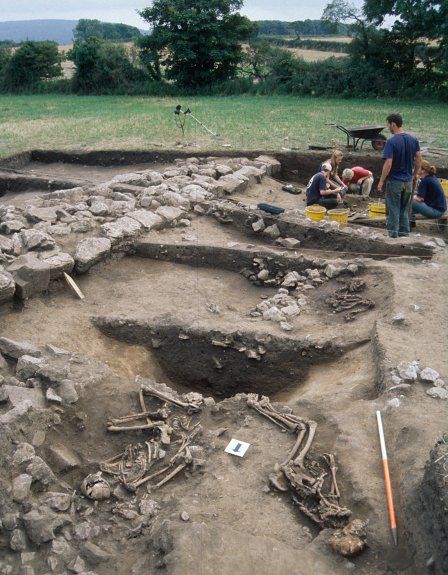 Excavating the enclosure ditch and skeletons at Llanbedrgoch (Anglesey).