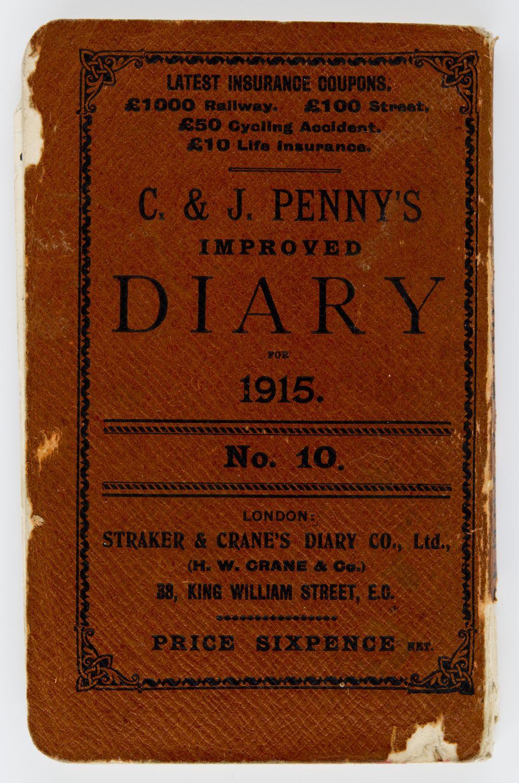 Dyddiadur coch gyda'r geiriau C. & J. PENNY’S IMPROVED DIARY FOR 1915 mewn inc du ar y blaen