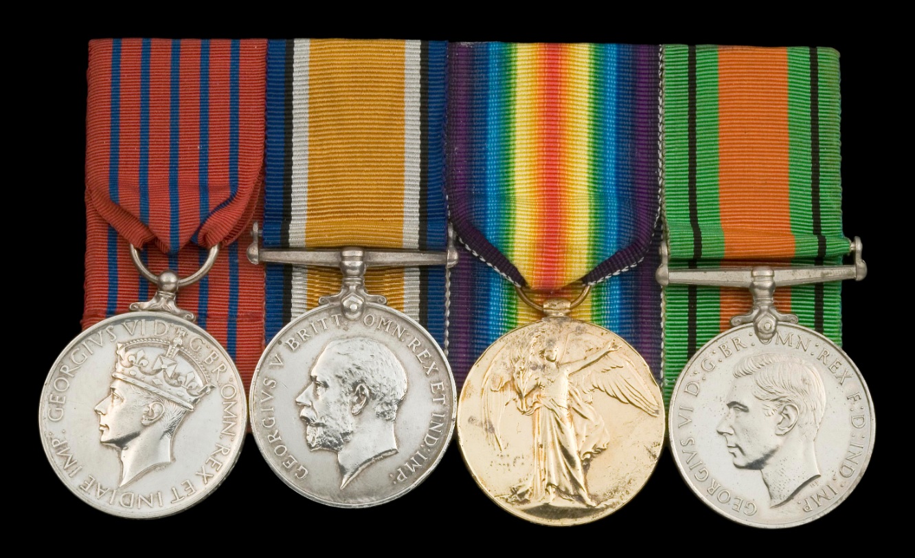 Medalau T.W. Keenan (o’r chwith i’r dde): Medal Siôr, Medalau Rhyfel a Buddugoliaeth Prydain (WW1), y Fedal Amddiffyn, 1939-1945